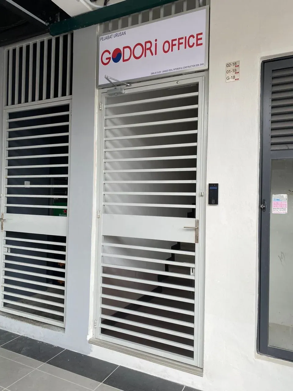 Office doorway with Godori Office signage, Permas Jaya