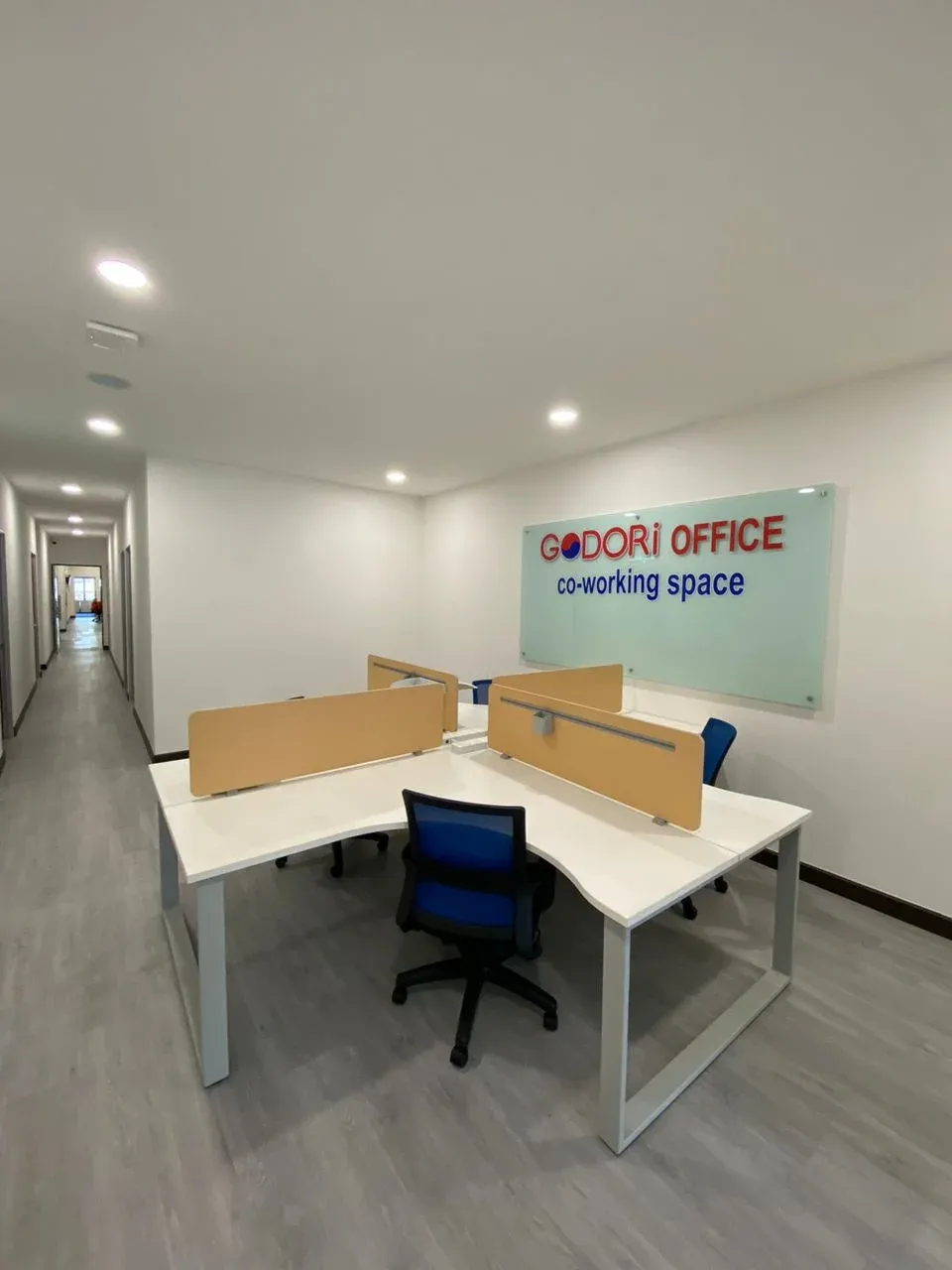 Shared desks with privacy panels at Godori Office Permas Jaya